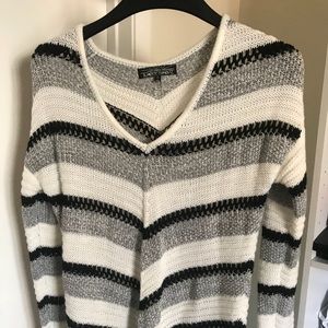 Gray and white knitted sweater